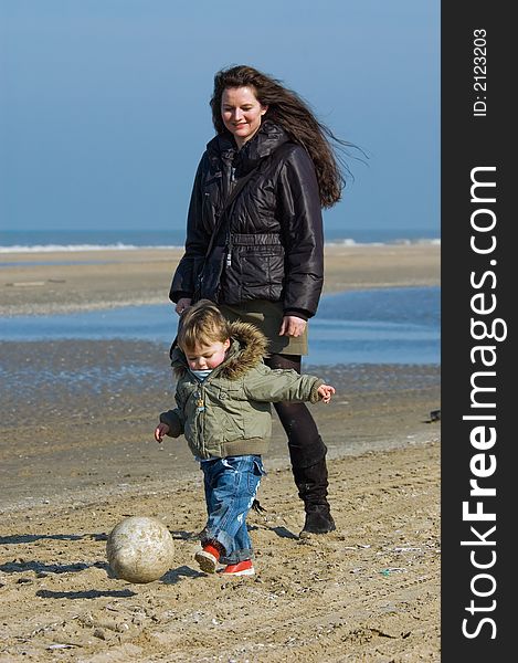 Mother and child on the beach