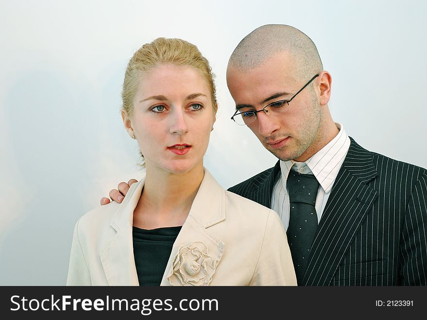 Young couple in office situation