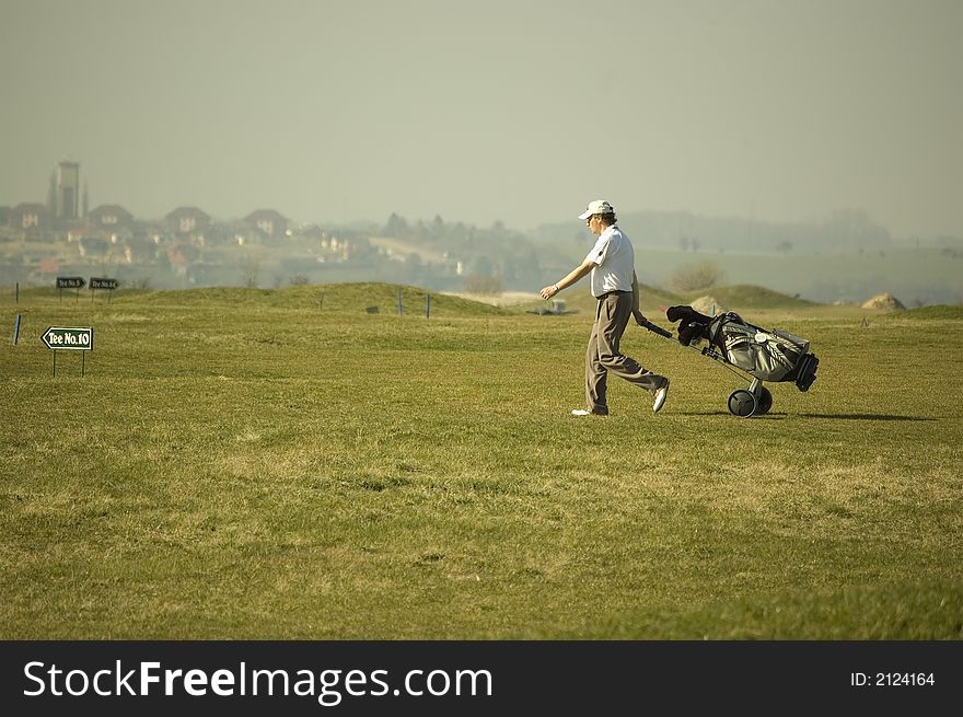 Man who play golf in Milovice in Czech Republic