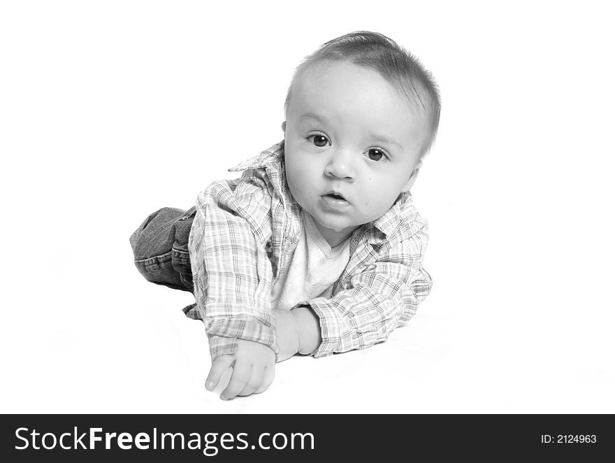 Little baby boy trying to crawl on the floor. Little baby boy trying to crawl on the floor