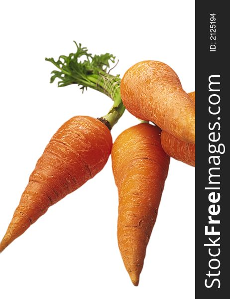 Cleared orange carrots on a white background