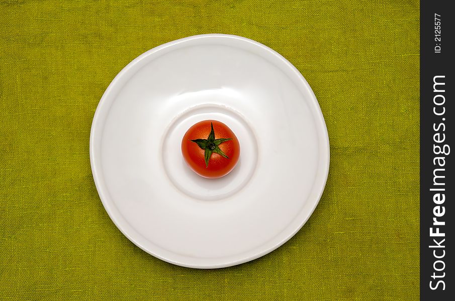 Cherry tomato on the white plate