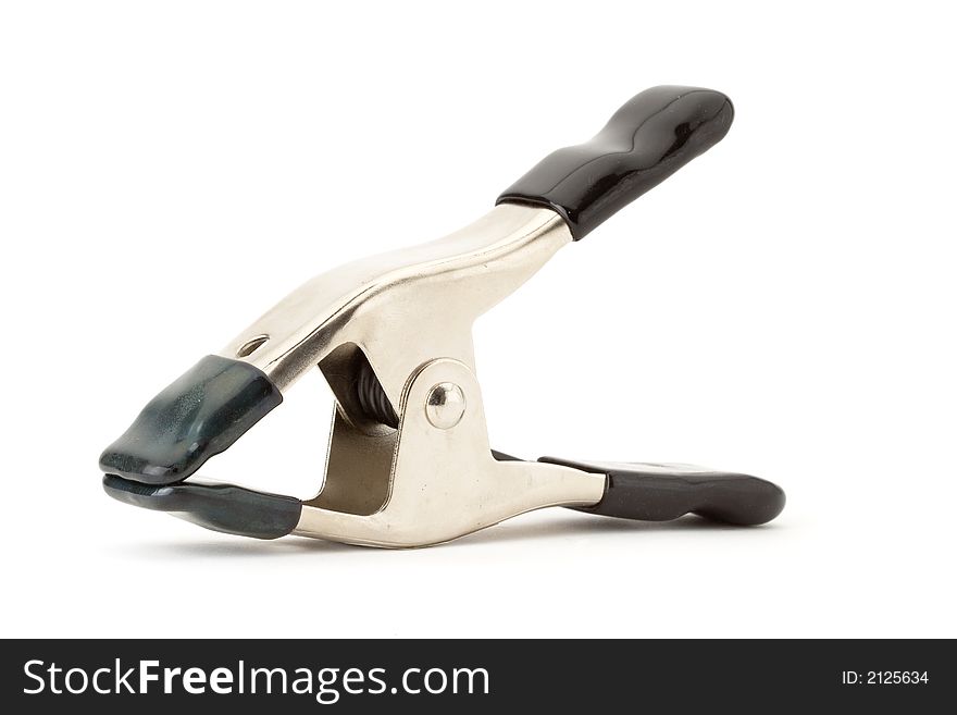 Metal clamp with black handles on white