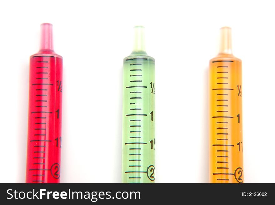 3 Syringe filled with different color solution. 3 Syringe filled with different color solution