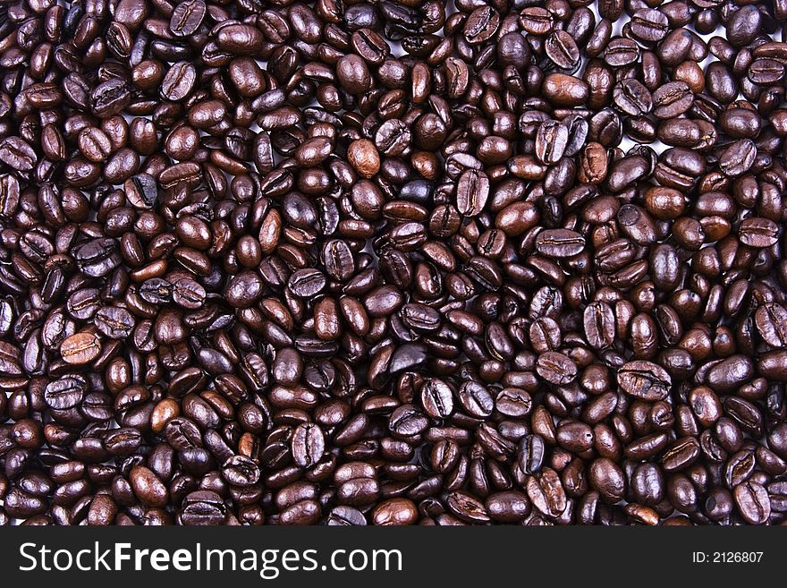 Close up of coffee bean as background. Close up of coffee bean as background.