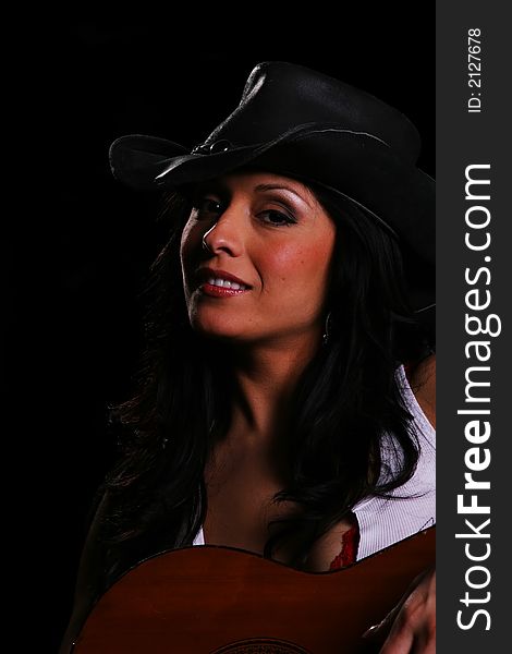 Classic country girl smiling and holding guitar close up portrait