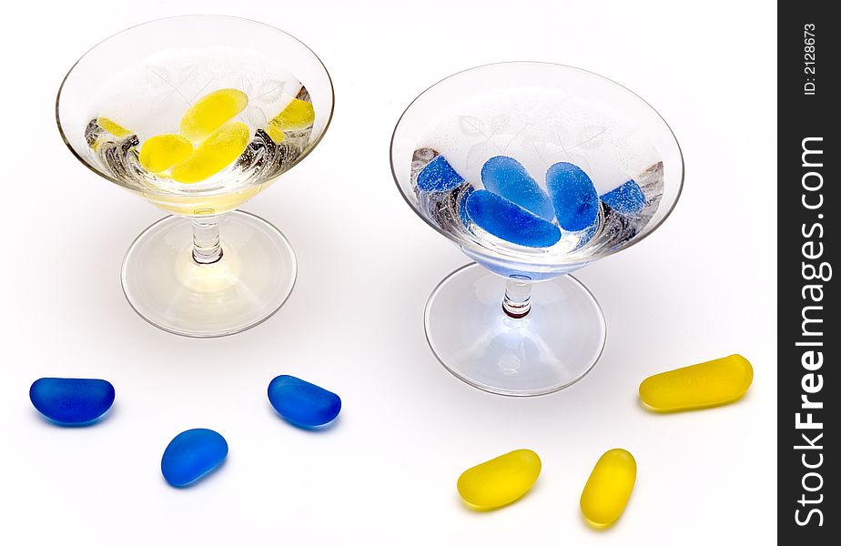 Colorful cocktails with yellow and blue pebbles. Colorful cocktails with yellow and blue pebbles