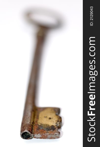 Macro shot of a rusty vintage key. Macro shot of a rusty vintage key