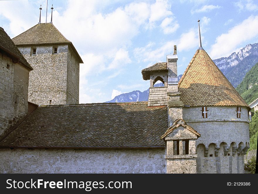 Towers and roofs of medieval castle of Chillon, on Geneva Lake in Switzerland. Towers and roofs of medieval castle of Chillon, on Geneva Lake in Switzerland.