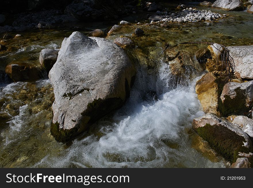 Clear mountain river between rocks stones ion. Clear mountain river between rocks stones ion