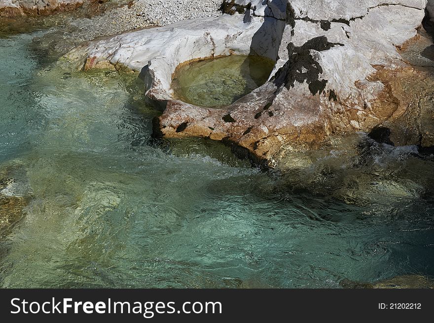 Crystal clear mountain river between rocks. Crystal clear mountain river between rocks