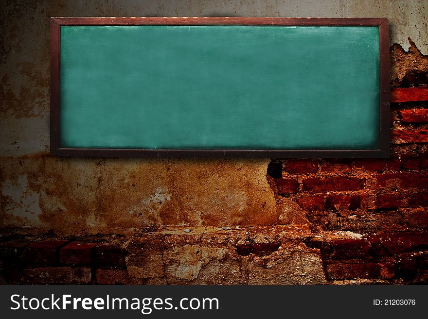 Wooden chalk board on grunge brick wall. Wooden chalk board on grunge brick wall