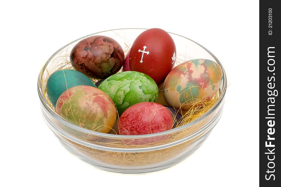 Easter varicoloured eggs on a glass