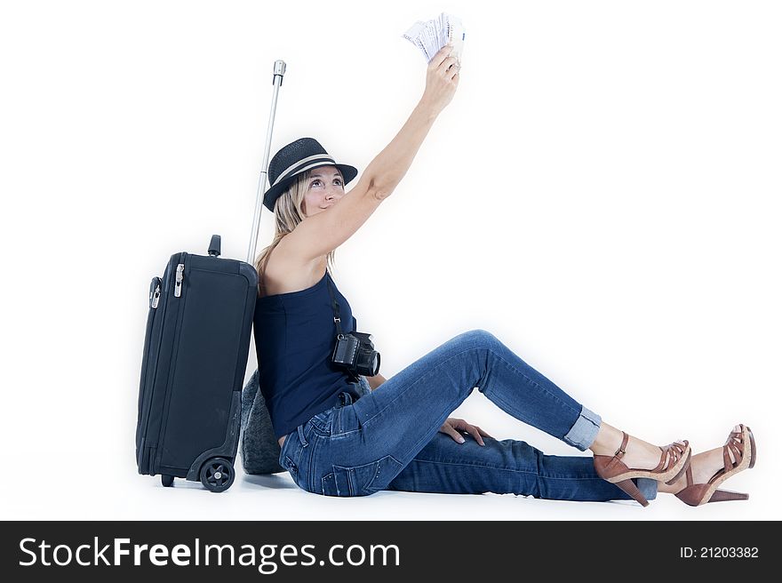 Tourist woman traveling with her luggage, cash and a camera. Tourist woman traveling with her luggage, cash and a camera