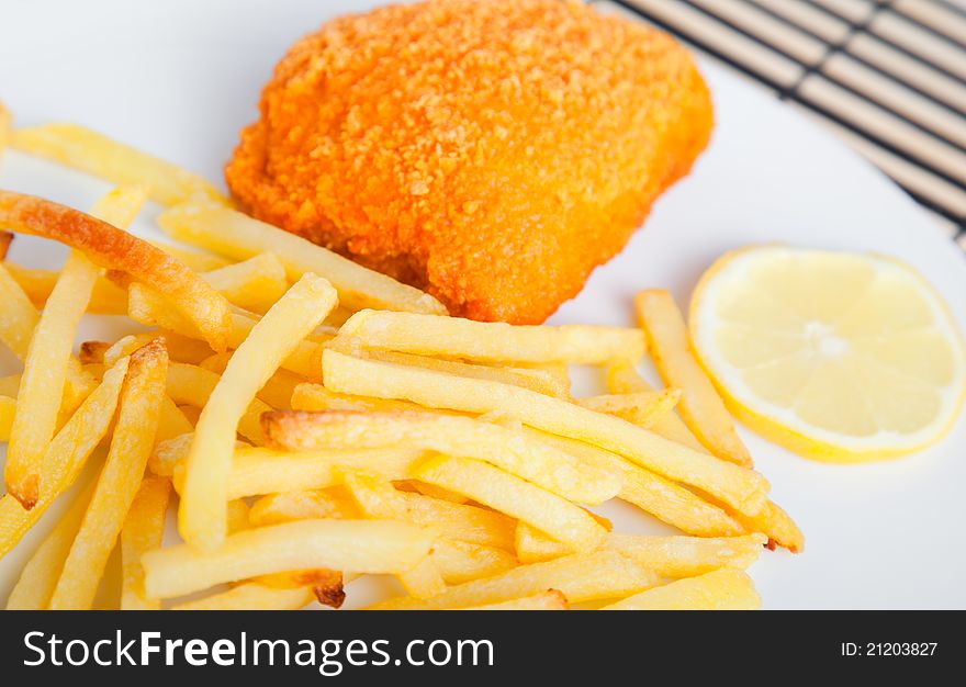 Quick fried meal: schnitzel with french fries