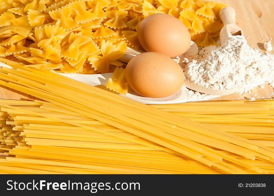 Food background: macaroni spagetti egg flour. Food background: macaroni spagetti egg flour