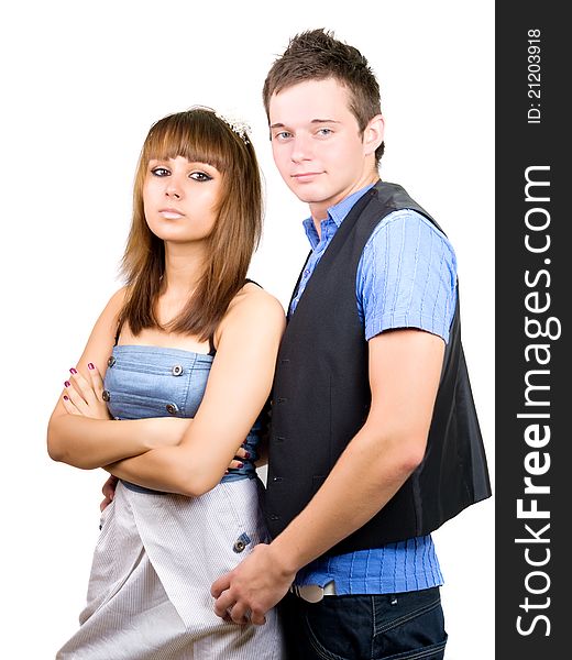 Portrait of a young handsome couple. Young men embraces women.