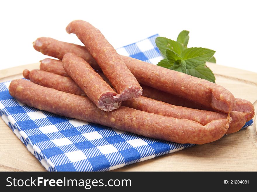 Mead sausages and mint on on napkin