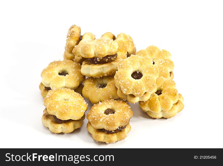 Biscuits stuffed with pineapple on white background.