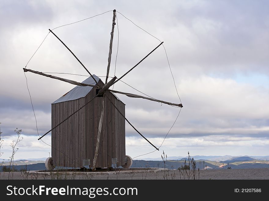 Rare and unique Portuguese traditional windmill with the particularity of weathervane, turning on itself to capture the wind. Rare and unique Portuguese traditional windmill with the particularity of weathervane, turning on itself to capture the wind