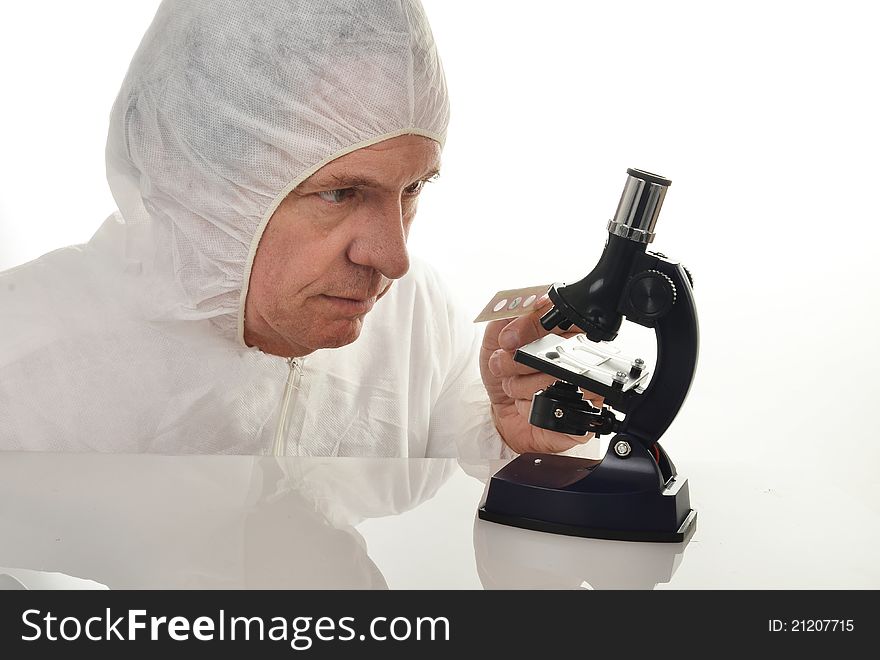 Scientist And Microscope