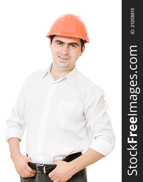 A successful businessman in the helmet on a white background. A successful businessman in the helmet on a white background