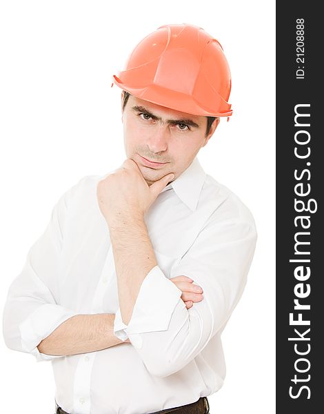 Thinking businessman in the helmet on a white background. Thinking businessman in the helmet on a white background