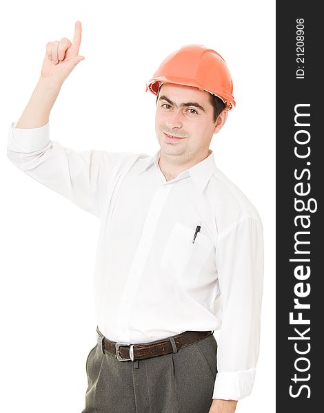 Businessman in helmet pointing up on a white background. Businessman in helmet pointing up on a white background