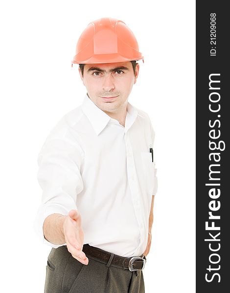 Businessman in helmet holds out his hand on a white background. Businessman in helmet holds out his hand on a white background.