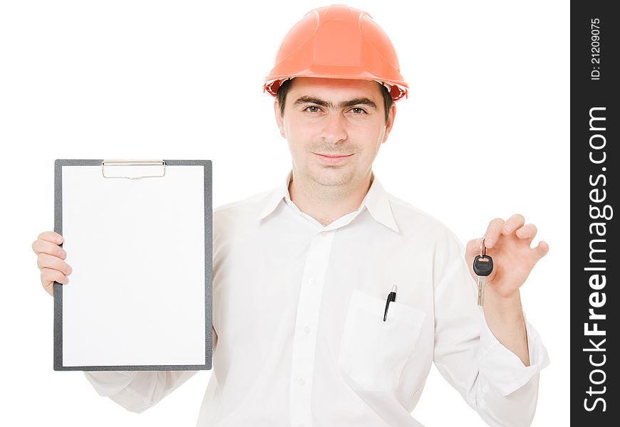 Businessman with a key in the helmet shows the blank page on a white background. Businessman with a key in the helmet shows the blank page on a white background.