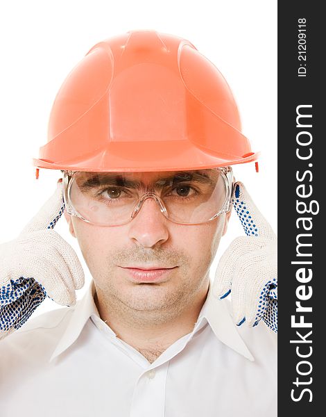 Businessman in a helmet on a white background.