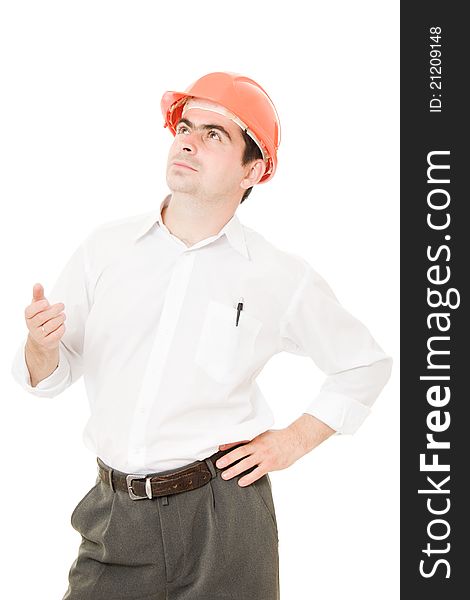 Businessman in a helmet looking up on a white background. Businessman in a helmet looking up on a white background.