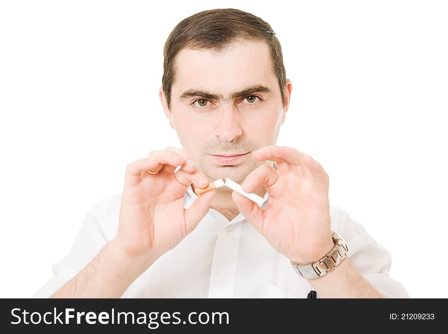 Businessman with a cigarette on a white background. Businessman with a cigarette on a white background.