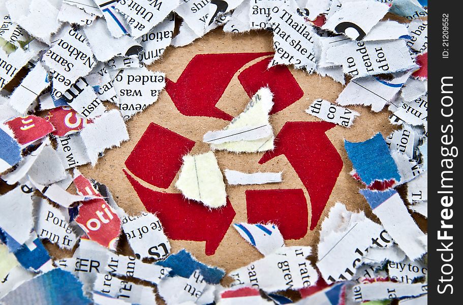 Recycle Symbol With Pieces Of Paper