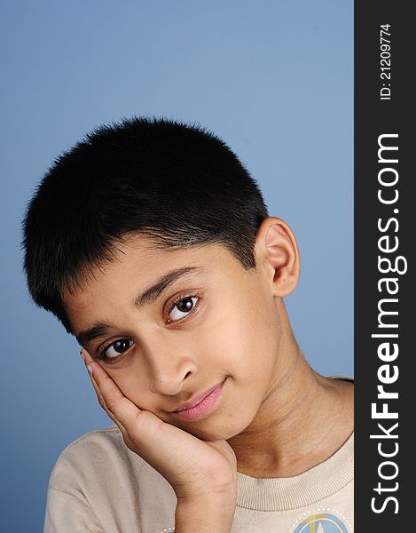 Portrait of an handsome young indian kid smiling