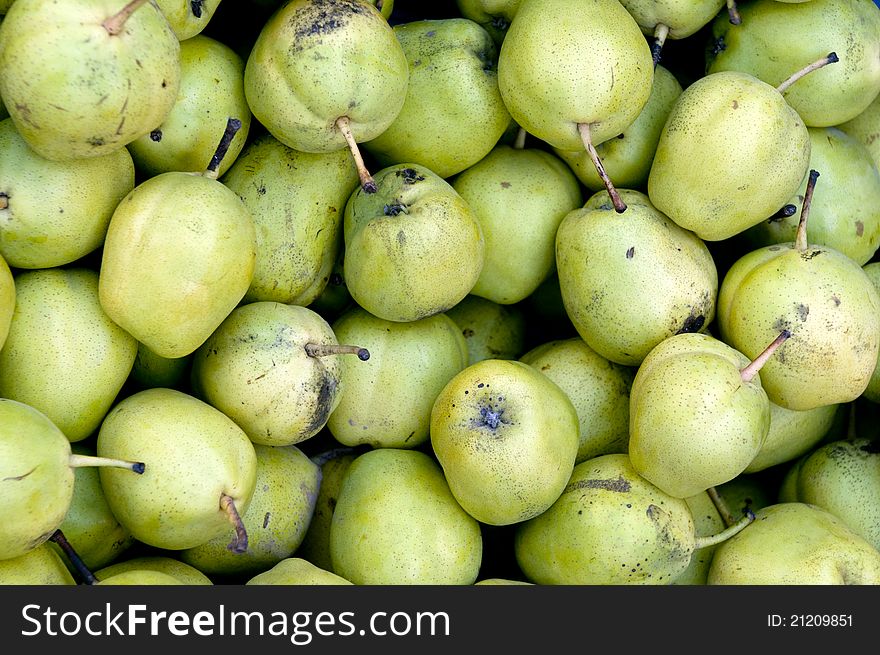 A bunch of garden fresh pears at a local market