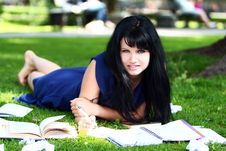 Beautiful Girl Studying In Park Stock Photography
