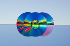 Three Dvd Discs On Mirror Stock Photo Three Dvd Discs On Mirror Stock Photo