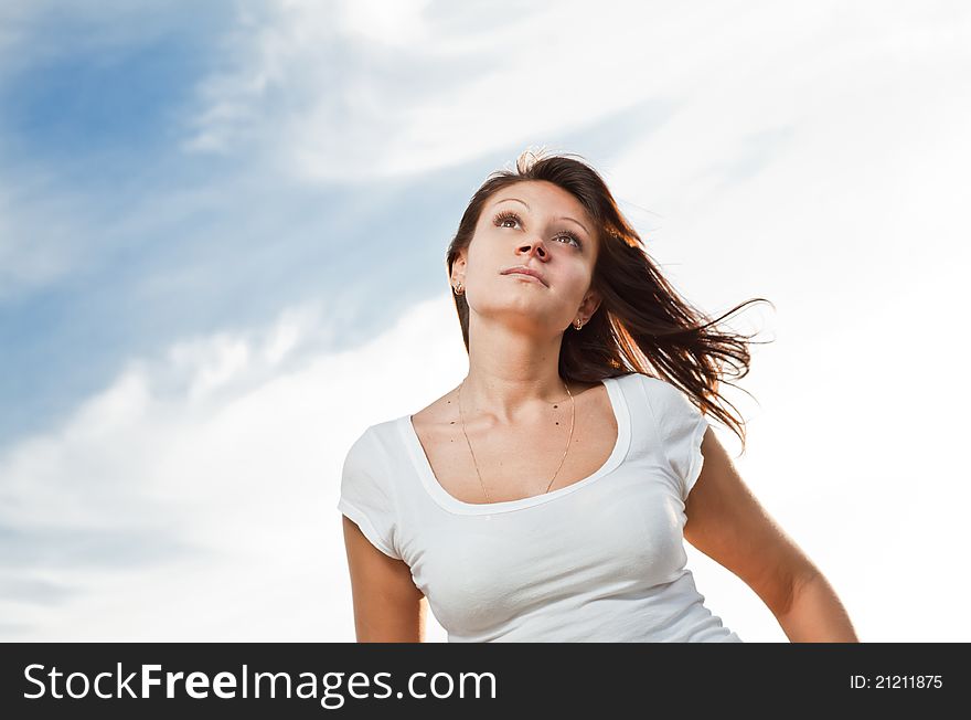 Happy young woman outdoors, summer time