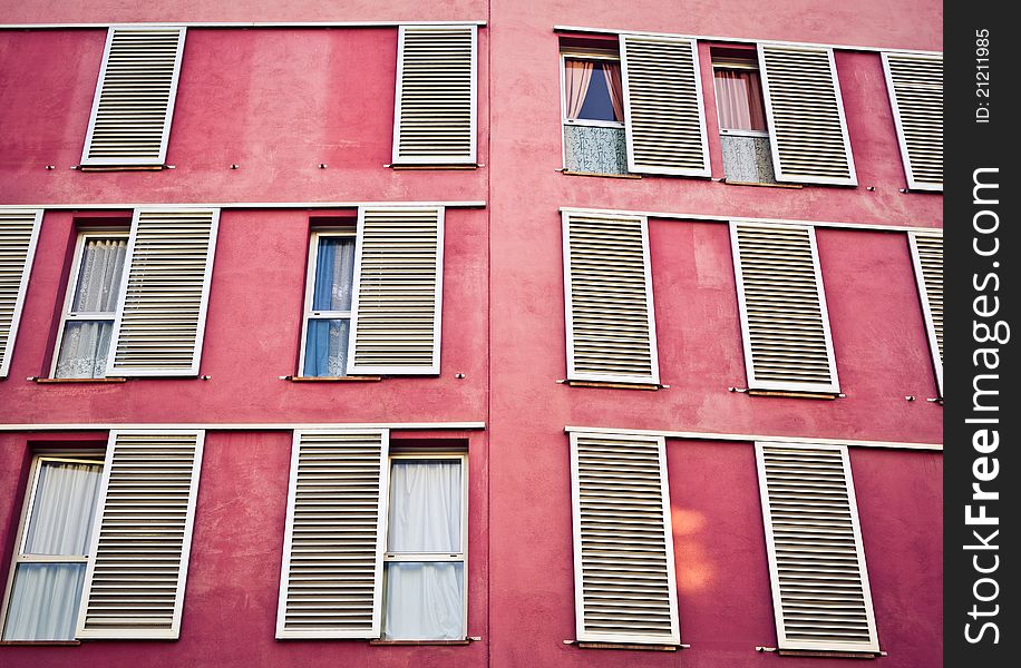 Windows on the pink wall