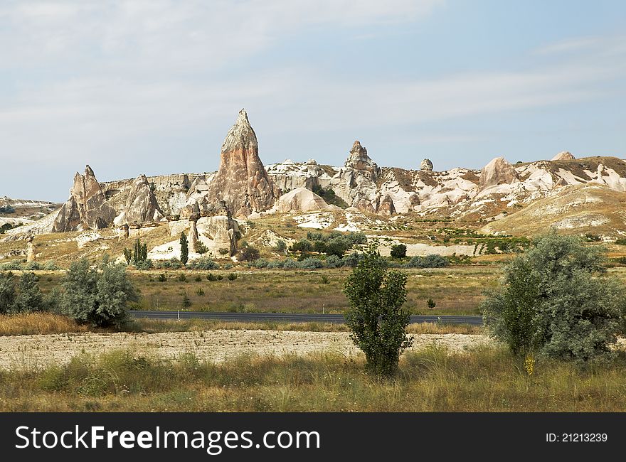 Volcanic lava ash rock formation in the wilderness of Cappadocia, Turkey, crop space, copy space and horizontal. Volcanic lava ash rock formation in the wilderness of Cappadocia, Turkey, crop space, copy space and horizontal