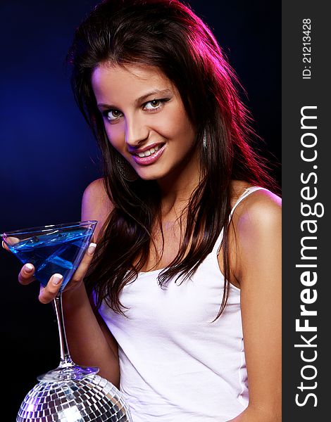 Young and beautiful woman in the nightclub