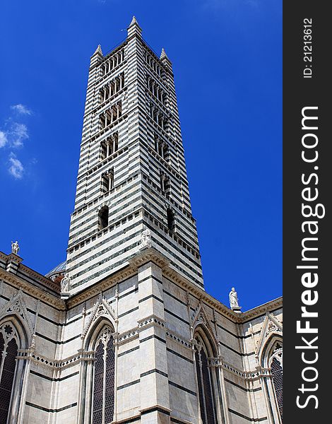 Tower of the Cathedral of Siena, a medieval church in Siena, Italy. Tower of the Cathedral of Siena, a medieval church in Siena, Italy