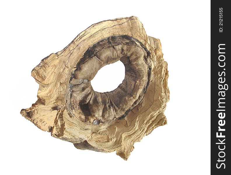 Piece from a tree with irregular shape and a hole in the middle. Isolated on white. Piece from a tree with irregular shape and a hole in the middle. Isolated on white.