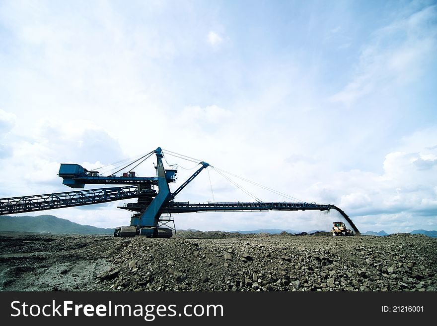 The spreader machine use for move material from one place to another place in a lot quantity in one time at Lignite mine of Thailand. The spreader machine use for move material from one place to another place in a lot quantity in one time at Lignite mine of Thailand