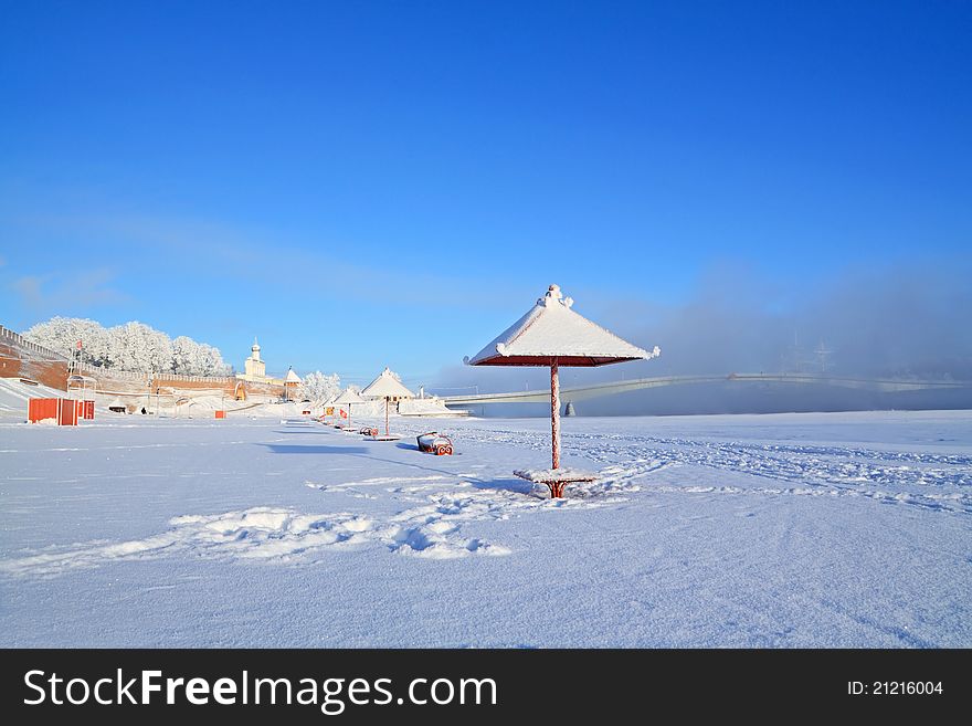 Town beach in  in winter snow