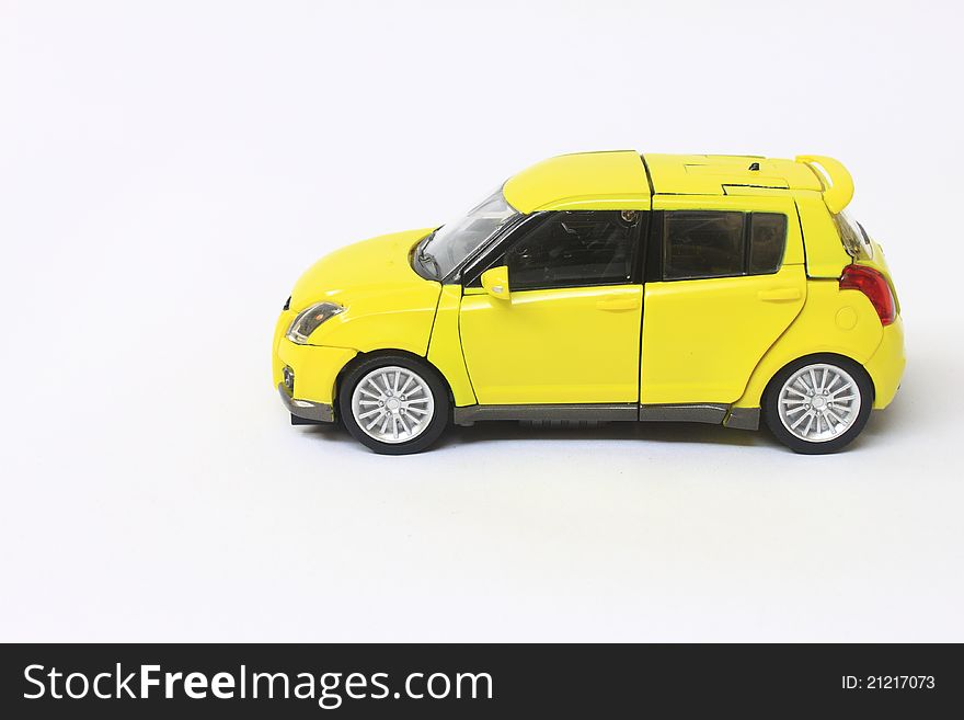 Yellow and small miniature car model