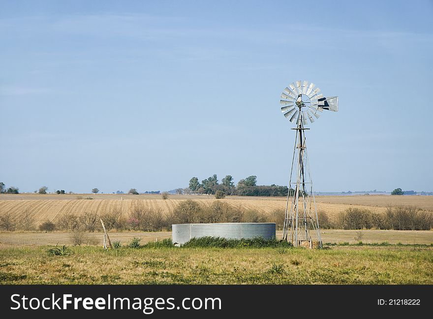 Windmill and Metallic Tank Horizontal