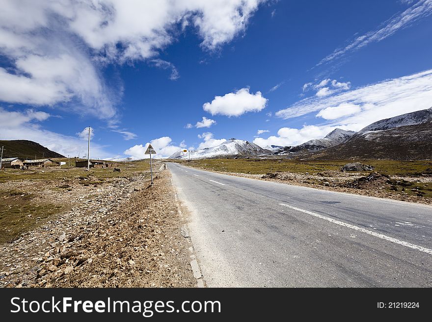 Empty road in the himalayas in tibet. Empty road in the himalayas in tibet.