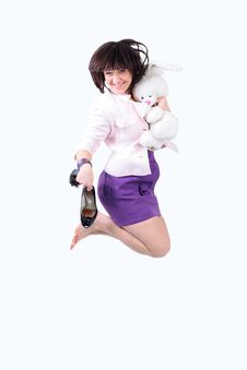Young Beautiful Woman Jumping In Joy With Plush R Royalty Free Stock Photos Young Beautiful Woman Jumping In Joy With Plush R Royalty Free Stock Photos